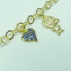 Pulseira menino com coração de zircônias azul